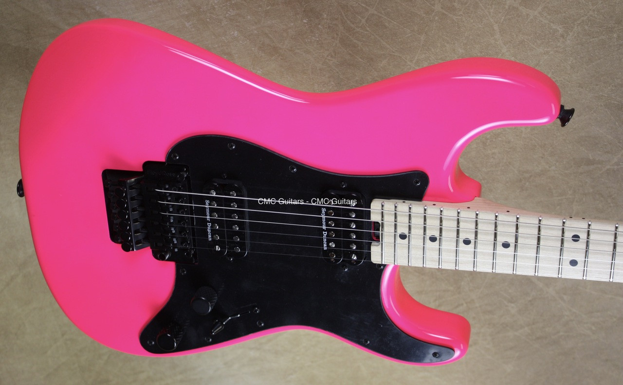 hot pink and black guitar