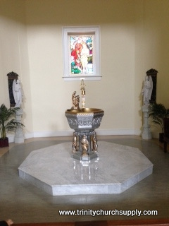 metal baptismal font