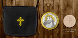 Black burse with yellow details. Gold and silver pyx featuring Ecce Homo.