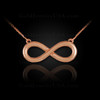 Solid, polished rose gold infinity necklace