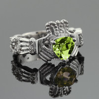 White Gold Claddagh Diamond Engagement Ring with its heart-shaped green Peridot gemstone.
