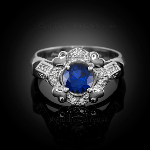 White gold blue sapphire diamond setting engagement ring.