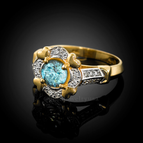 Gold Aquamarine Gemstone Engagement Ring with Diamond Setting.