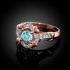 Rose Gold Aquamarine Gemstone Engagement Ring with Diamond Setting.