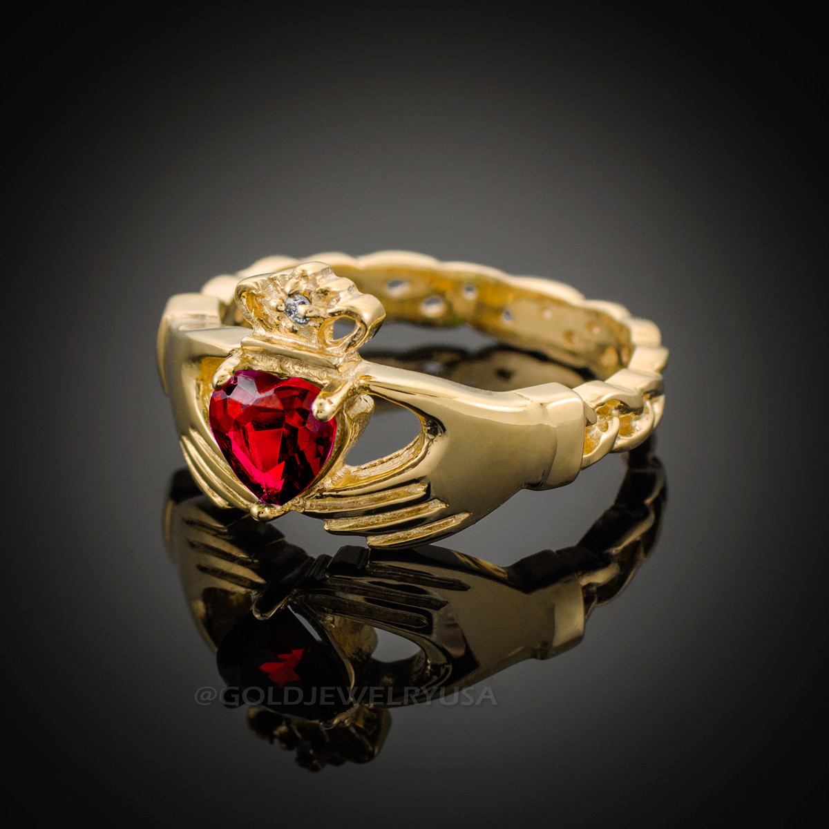 gold claddagh ring with ruby