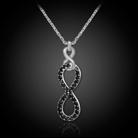 White gold vertical infinity with black diamonds