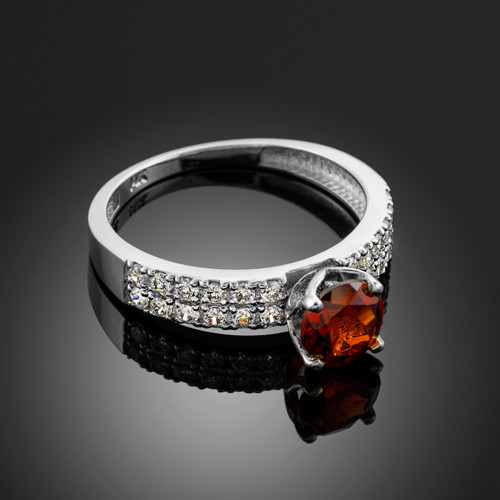 Ladies Diamond pave white gold Engagement/Anniversary ring with Garnet center stone.