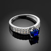 Ladies Diamond pave white gold Engagement/Anniversary ring with Blue Sapphire center stone.