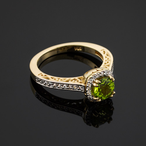 Gold Peridot center stone diamond engagement ring.