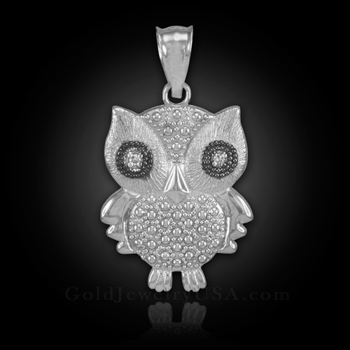 White gold owl charm pendant with diamonds.