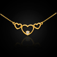 14K Gold Triple Heart Necklace with CZ