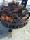 Custom heavy duty fire pit with legs and solid, welded steel bottom.