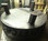 Custom heavy duty fire pit with legs and solid, welded steel bottom.