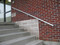 One-line Aluminum Handrail used as grab rail up a flight of stairs