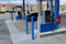 1/8" Accessible Blue 4" Bollard Covers at gas station