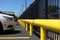 Line of One-Line Heavy Duty Industrial Guardrail in a parking lot 