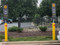 Yellow Heavy Duty Sign Bollards with custom decals used for designated drive-thru parking at McDonald's 