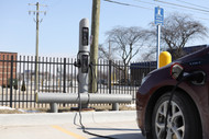 Electric Vehicle Charging Station with one-line guardrail for protection 