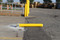 Collapsible Locking Bollard in collapsed position to allow service vehicle entry