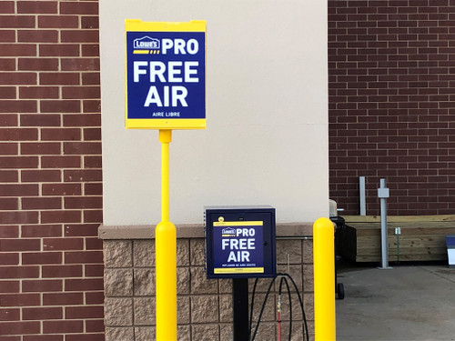 The Tri-Sign Topper on a Bollard Sign System for free air 