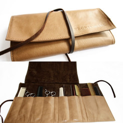 Made from luxurious cowhide leather, the Styling Roll Pouch by Fronis Hair is ideal for protecting all your valuable scissors, combs and other hair and make-up tools and accessories.

With nine pockets, this light weight beauty rolls up compact enough to comfortably fit in your satchel.

Available in black and a delicious camel colour. 

Width 43cm

Height 24cm

Weight 210g