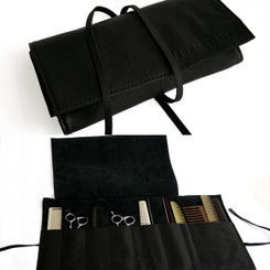 Made from luxurious cowhide leather, the Styling Roll Pouch by Fronis Hair is ideal for protecting all your valuable scissors, combs and other hair and make-up tools and accessories.

With nine pockets, this light weight beauty rolls up compact enough to comfortably fit in your satchel.

Available in black and a delicious camel colour. 

Width 43cm

Height 24cm

Weight 210g