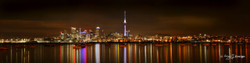 Auckland City Skytower and cityscape with water reflections - landscape photo print for sale.