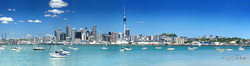 Auckland City landscape, New Zealand cityscape showing the city skyline over blue waters.