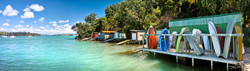 Rocky Bay Boatsheds, Waiheke Island, NZ - panoramic landscape photo print for sale by Lucy G