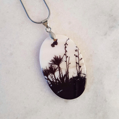 Flax, Cabbage Tree and Tui bird necklace pendant.