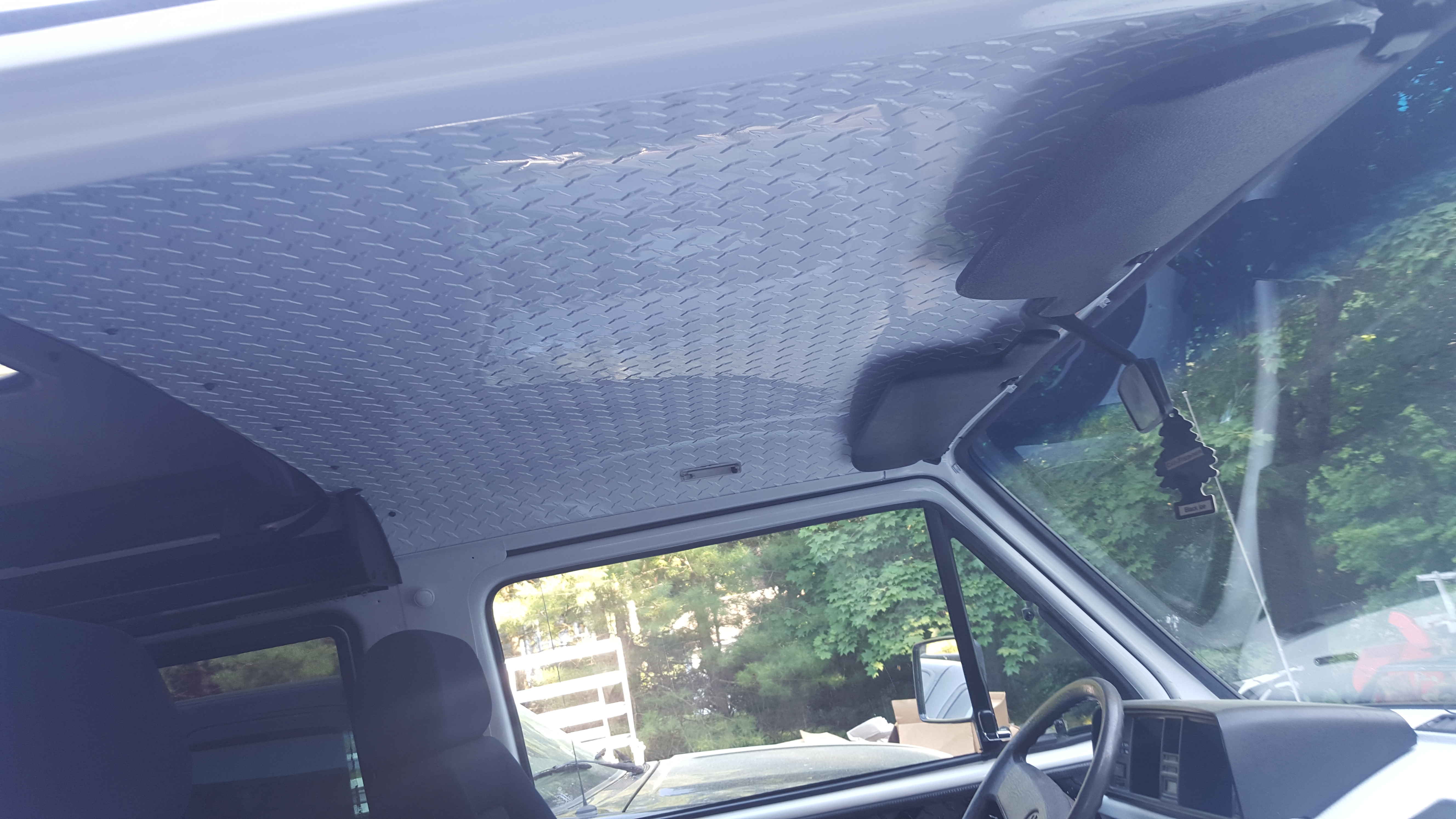 Roof of vehicle with diamond plate from CutsMetal