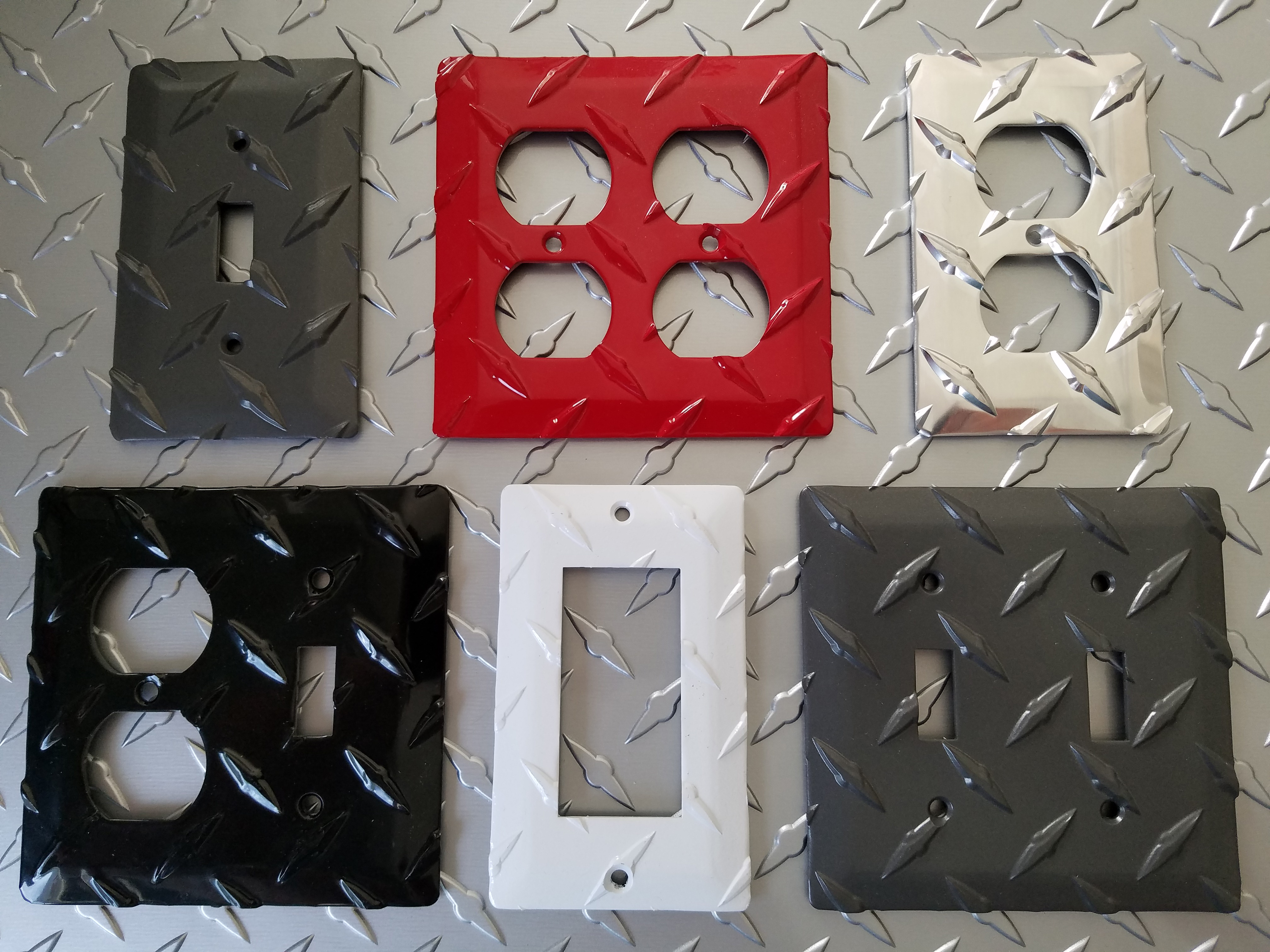 Colored diamond plate switch plates and outlet covers from CutsMetal.