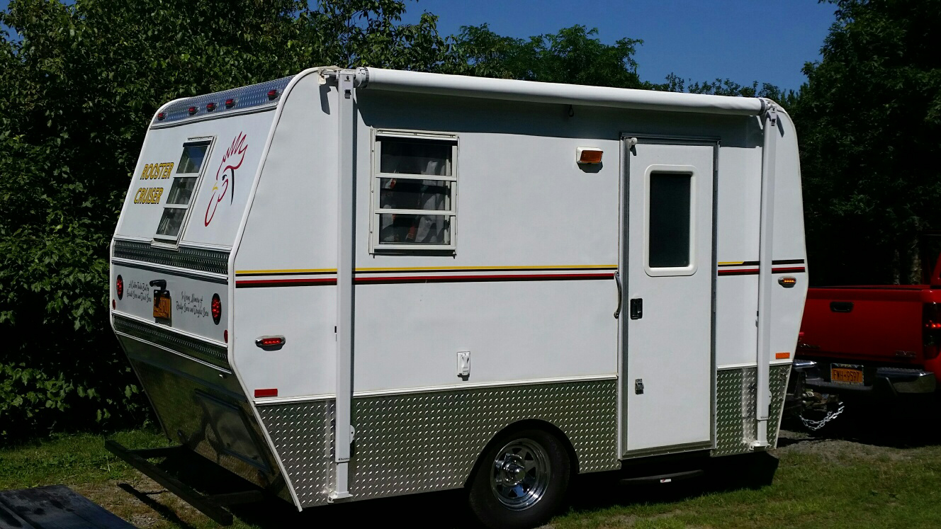 Camper refinished with diamond plate from CutsMetal