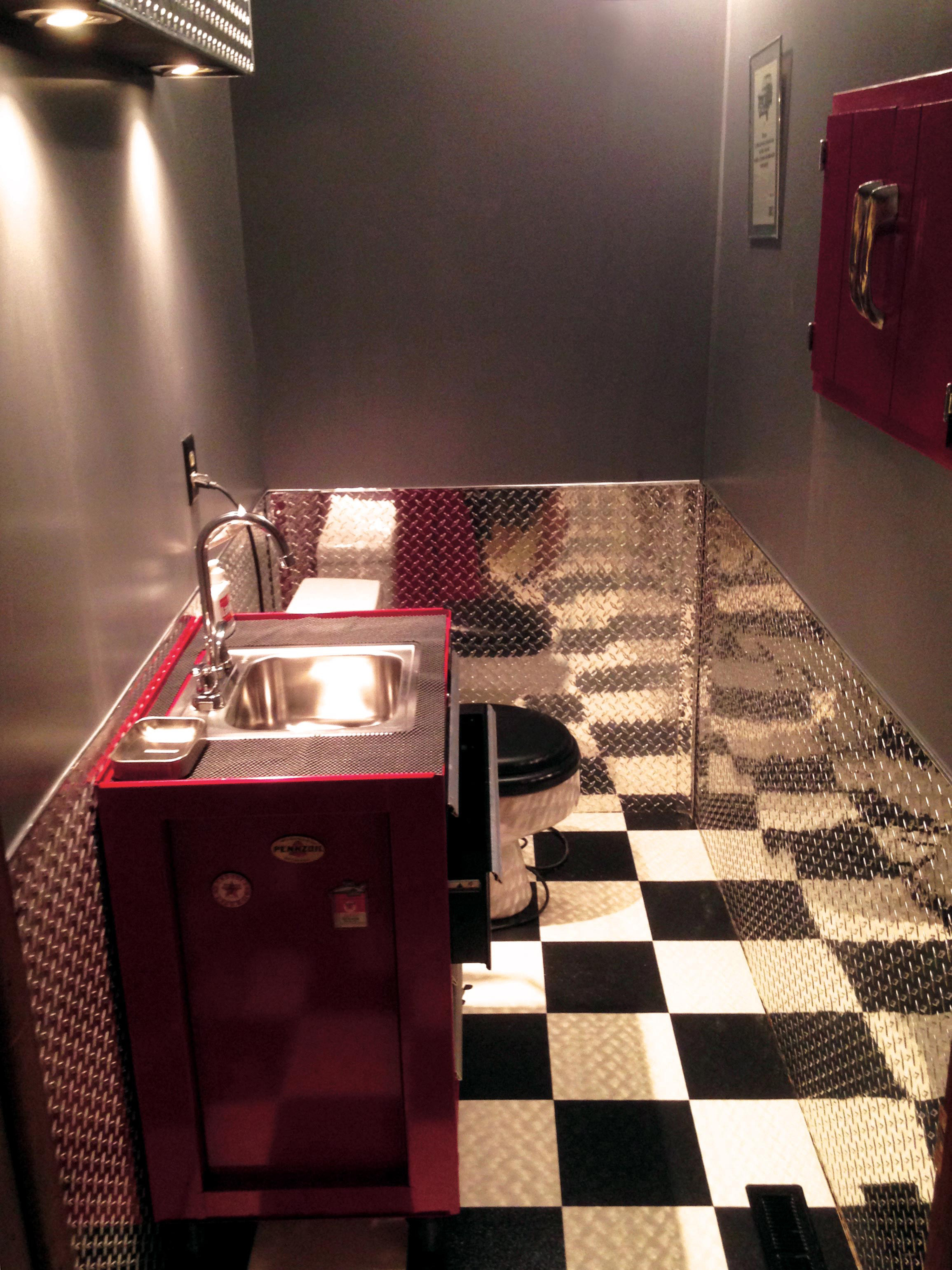 Small bathrooms look larger with diamond plate from CutsMetal