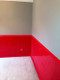 36" Red painted cosmetic grade diamond plate wainscoting.  This is the beginning of a Monster Truck room for a boy.  Can not wait to see the finished product!
