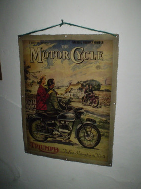 Vintage 1970's Triumph motorcycle sign depicting a 1950's scene