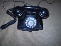 Visually the Telephone appears in good order. Internal mouth piece needs repair