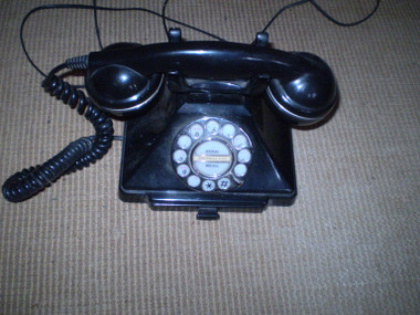 Visually the Telephone appears in good order. Internal mouth piece needs repair