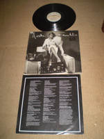 Lovely vinyl on this album with some light wear to cover