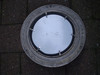 Porthole from reverse showing back of mirror