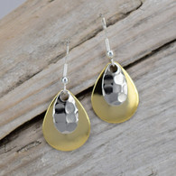 Small pair of gold plated earrings and a hammered silver accent piece.