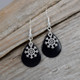 BLACK snow flake earrings.  Perfect for the holidays.  Dimensions:  3/4" x 1/2"