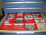 Tool Box Drawer Organized with 6' x 6" x 3" Red Plastic Boxes
