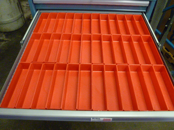 Tool Box Drawer divided by 2" x 8" x 2" red plastic boxes