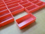 Tool box drawer with 2" x 4" x 1" Red Plastic Boxes