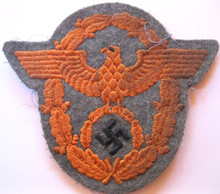 WW2 German Army Feldgendarmerie (Military Police) Sleeve Eagle from "The Dachau Hord". The color varies between late war police green and Felgrau 44 due to then available materials and dye lots. 