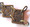 N.S.D.A.P. gorget chain. Bronzed panels of alternating eagle/swastika and swastika/oak leaves held together with brass wire loops. Panels show the markings "RM M1/128". Original era manufacture. Length of 19 original links (one complete side) for the NSDAP Standard Bearers bearers gorget, one of the links has an RZM mark on its reverse. Rare!