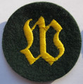 WW2 German Army Wallmeister (Fortifications NCO) Sleeve Patch, Felt. Machine embroidered Gothic "W" on a dark blue-green wool disc There are slight variations of material backing, colour and embroidery style between these patches. Appears unissued, Exc.