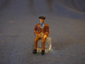PAINTED PEWTER OLDER MAN SITTING FIGURE O GAUGE