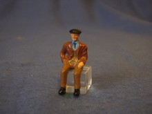 PAINTED PEWTER OLDER MAN SITTING FIGURE O GAUGE